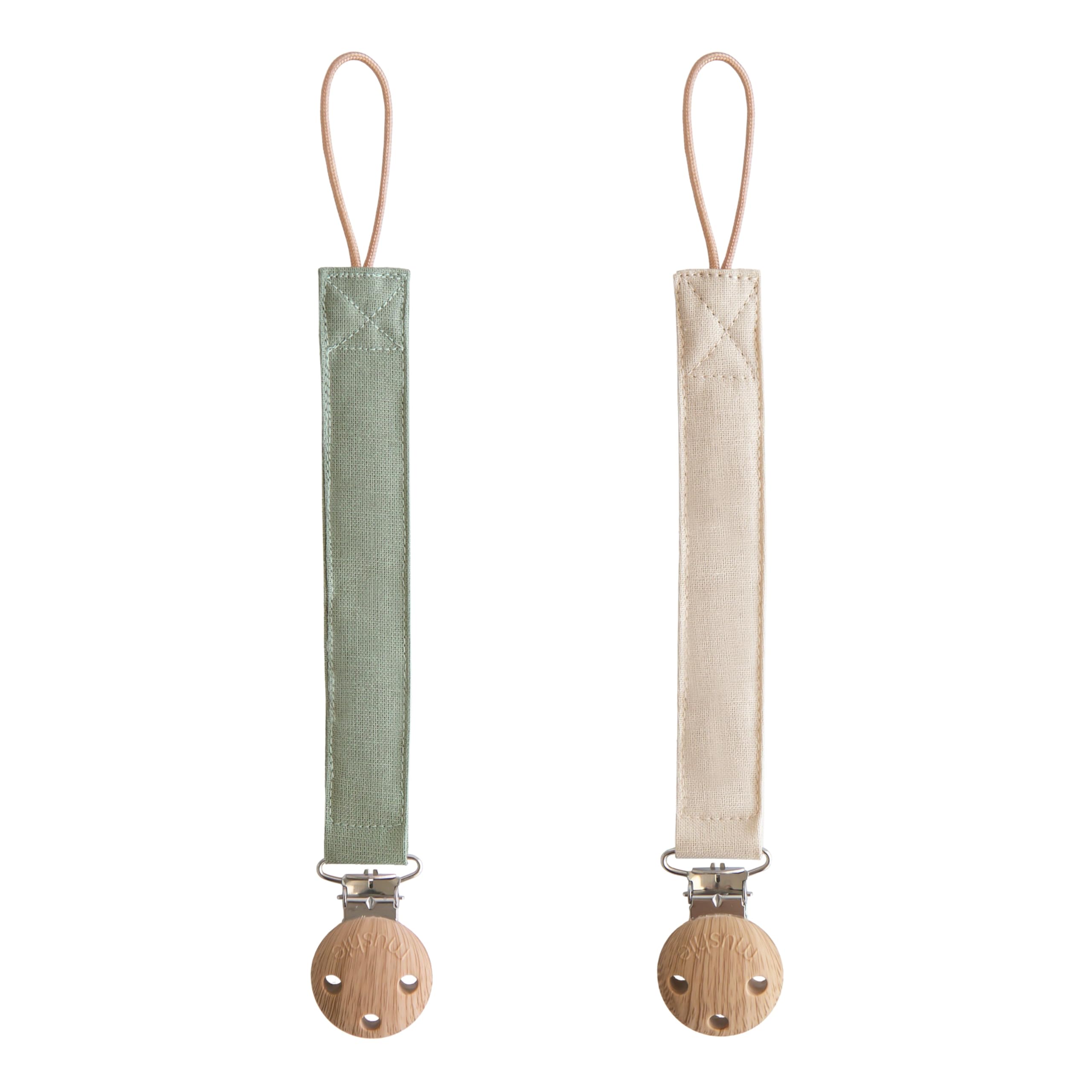 Mushie olive linen pacifier clip with soft fabric and secure clasp