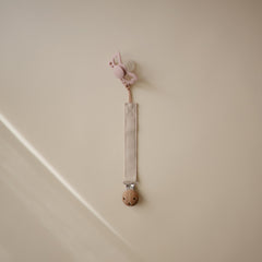Mushie pacifier clip soft fabric closeup showing gentle texture