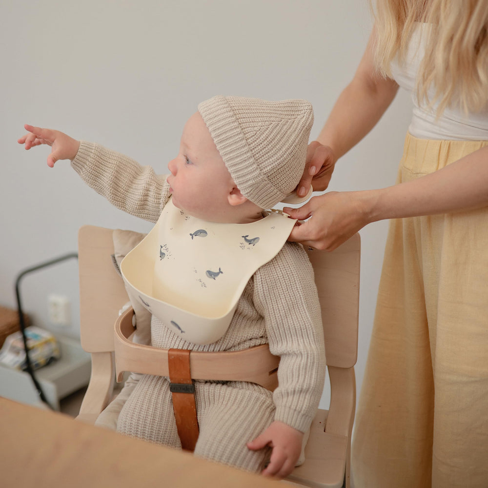 Mushie silicone bibs are easy to clean and resist stains.