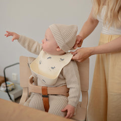 Mushie silicone bibs are easy to clean and resist stains.