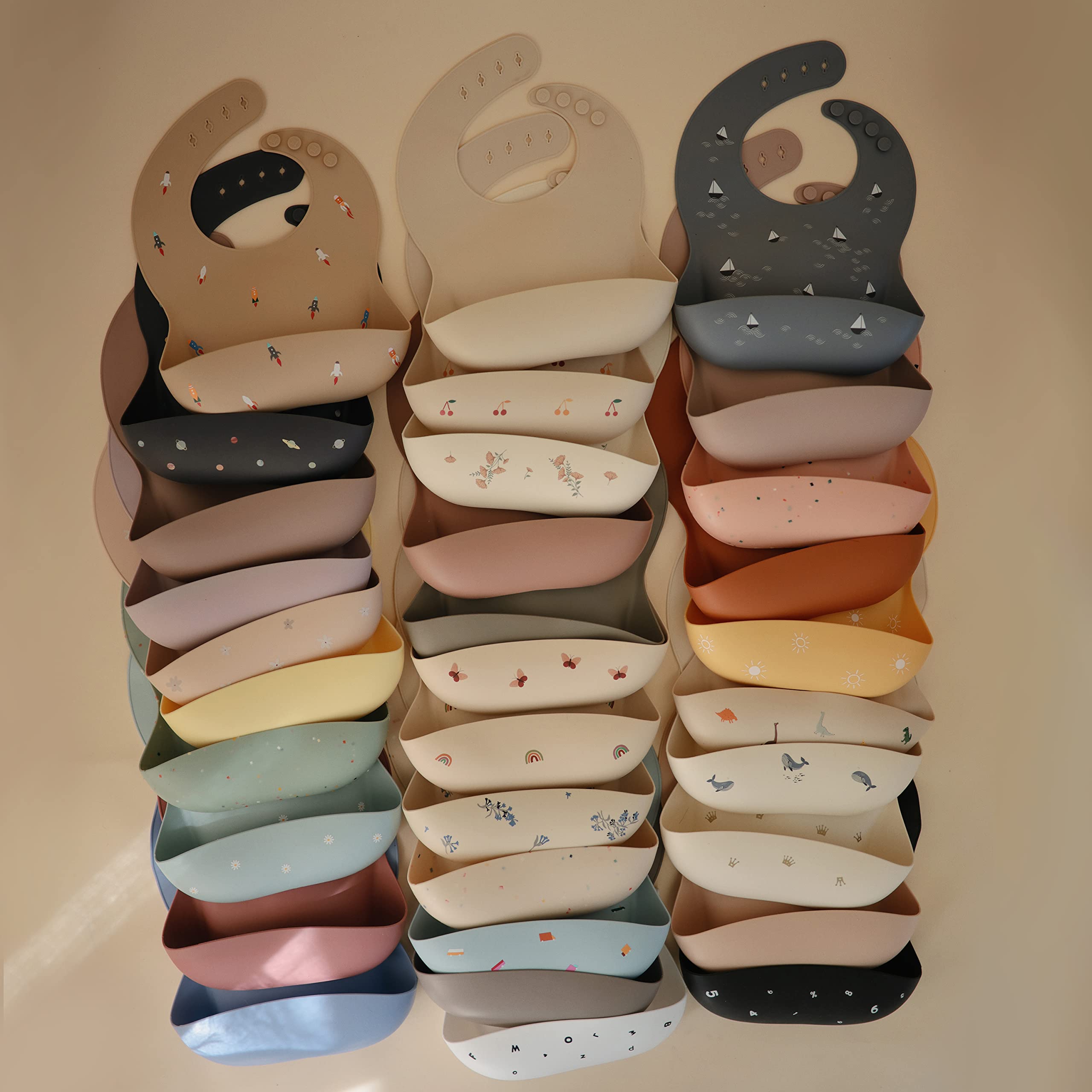 Mushie whales pattern bib designed in Sweden for timeless style.