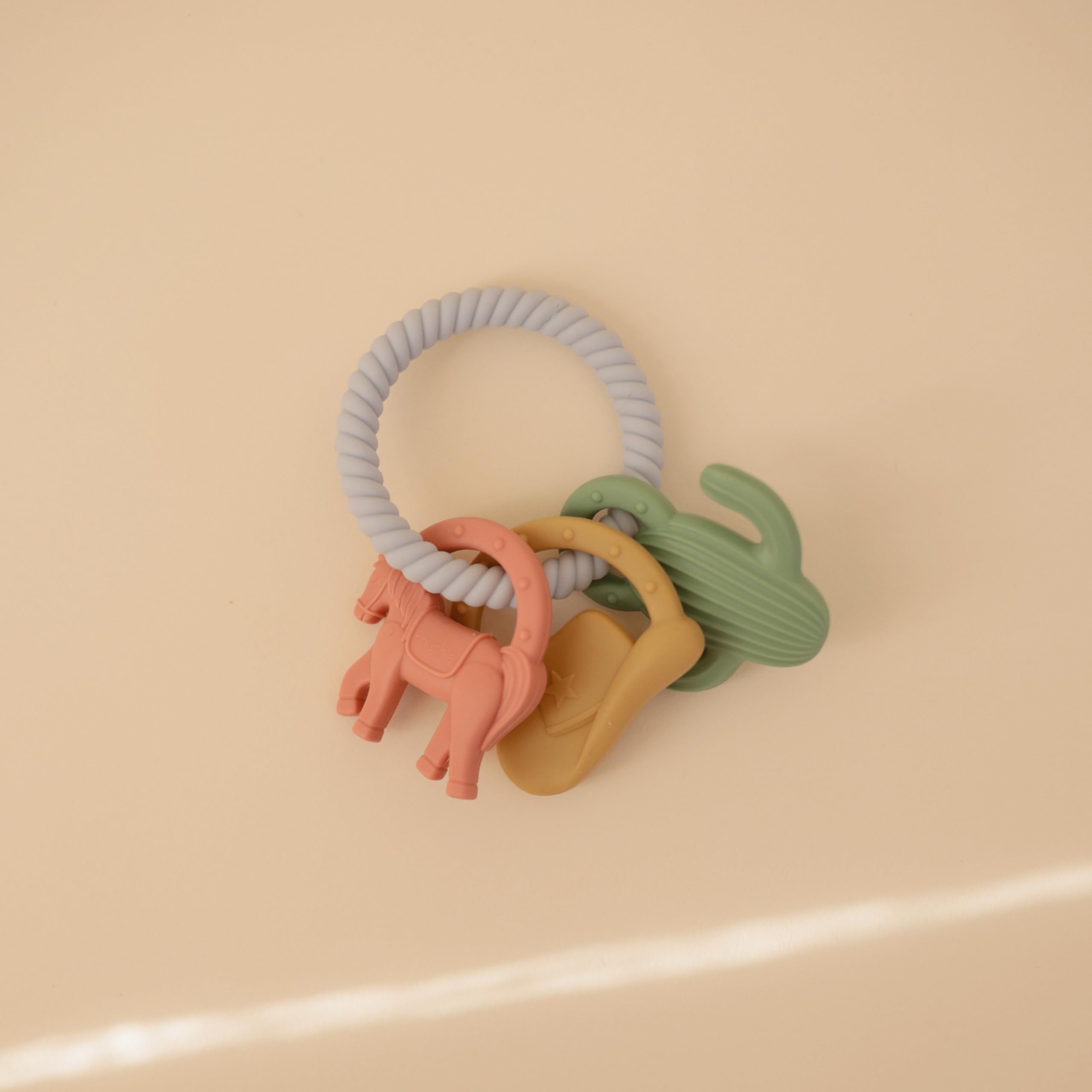 Mushie teething ring available in color variants to suit baby preference