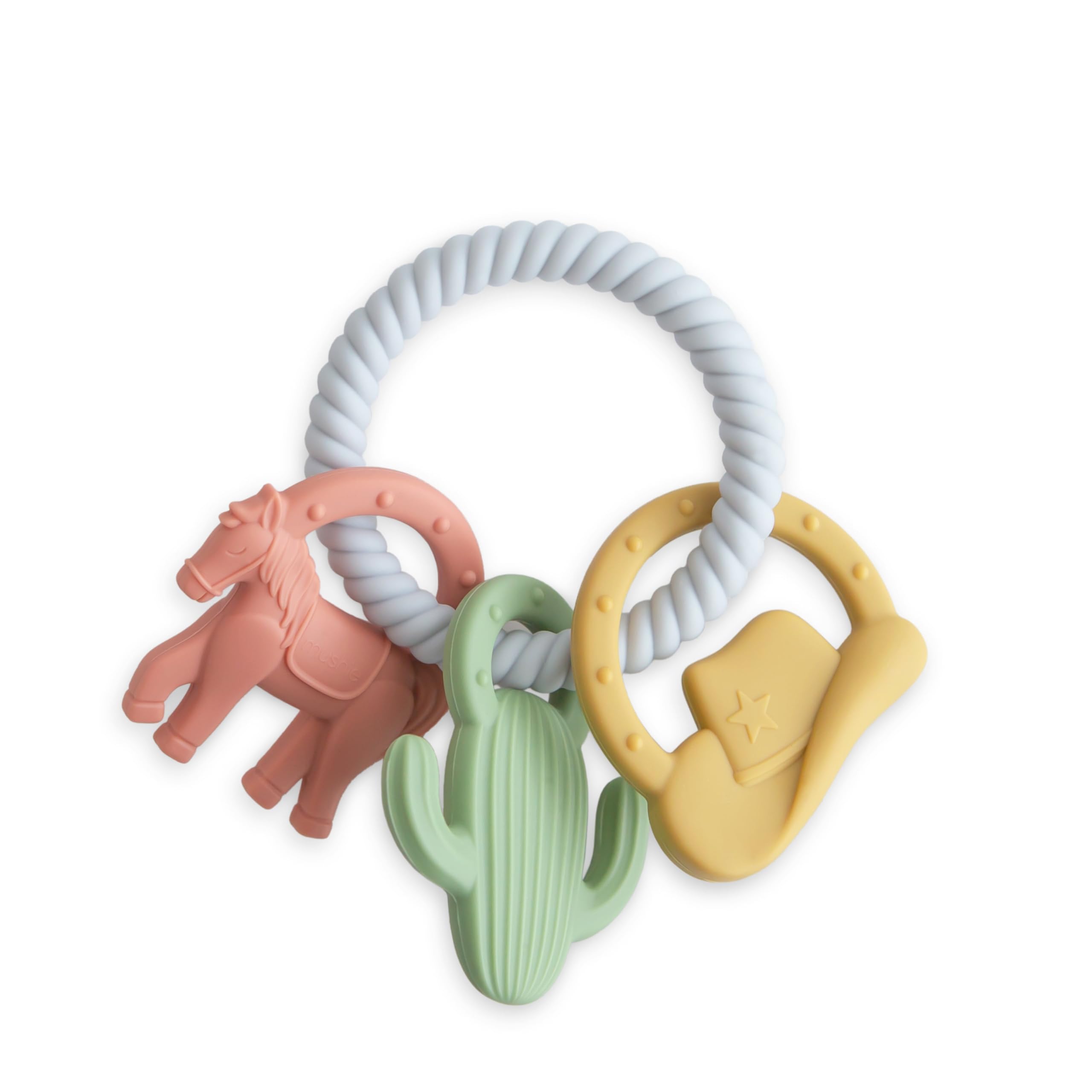 Mushie silicone western teething ring with three dino figures for soothing gums