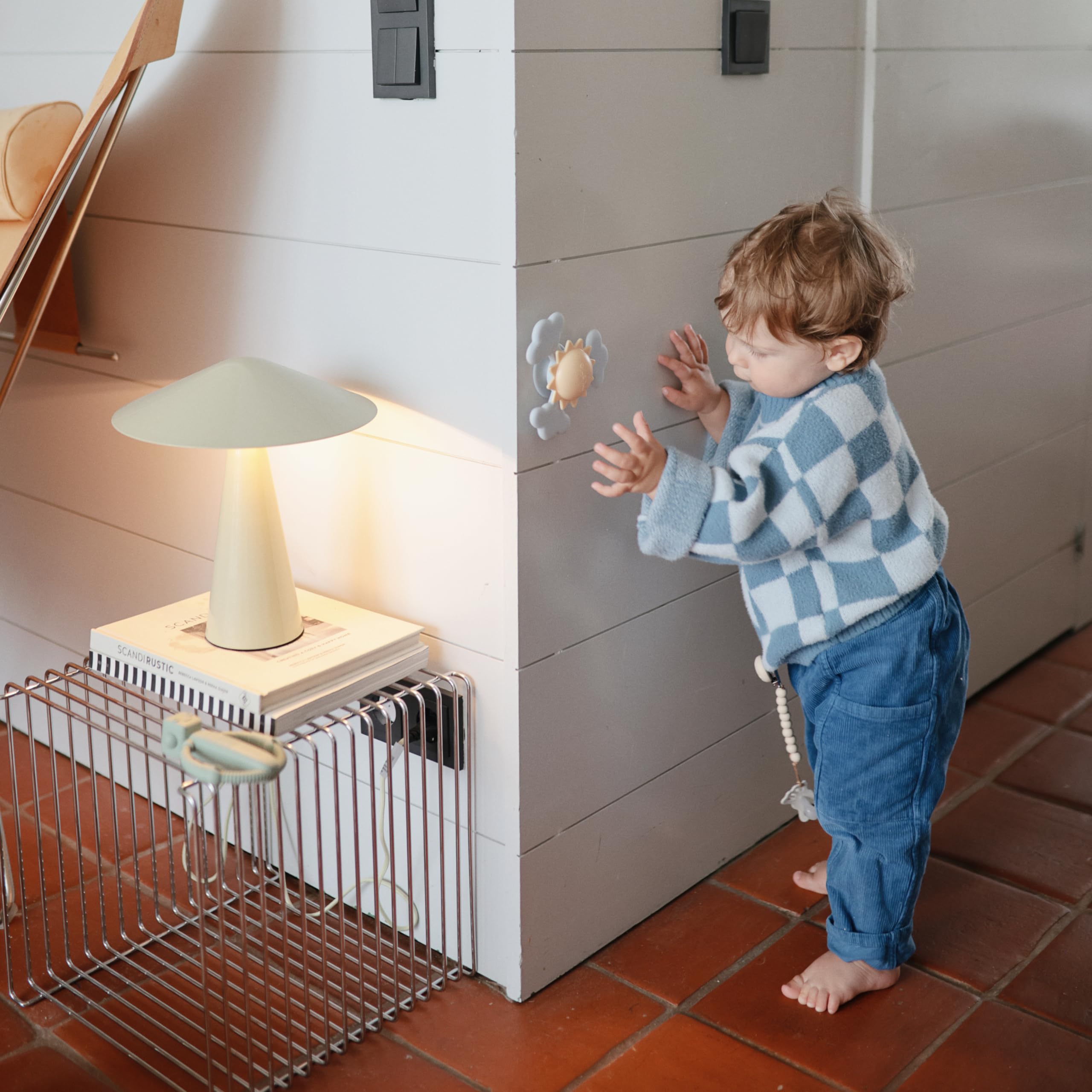 Mushie Sunshine Suction Spinner Toy bath-time silicone clouds for water-friendly fun.
