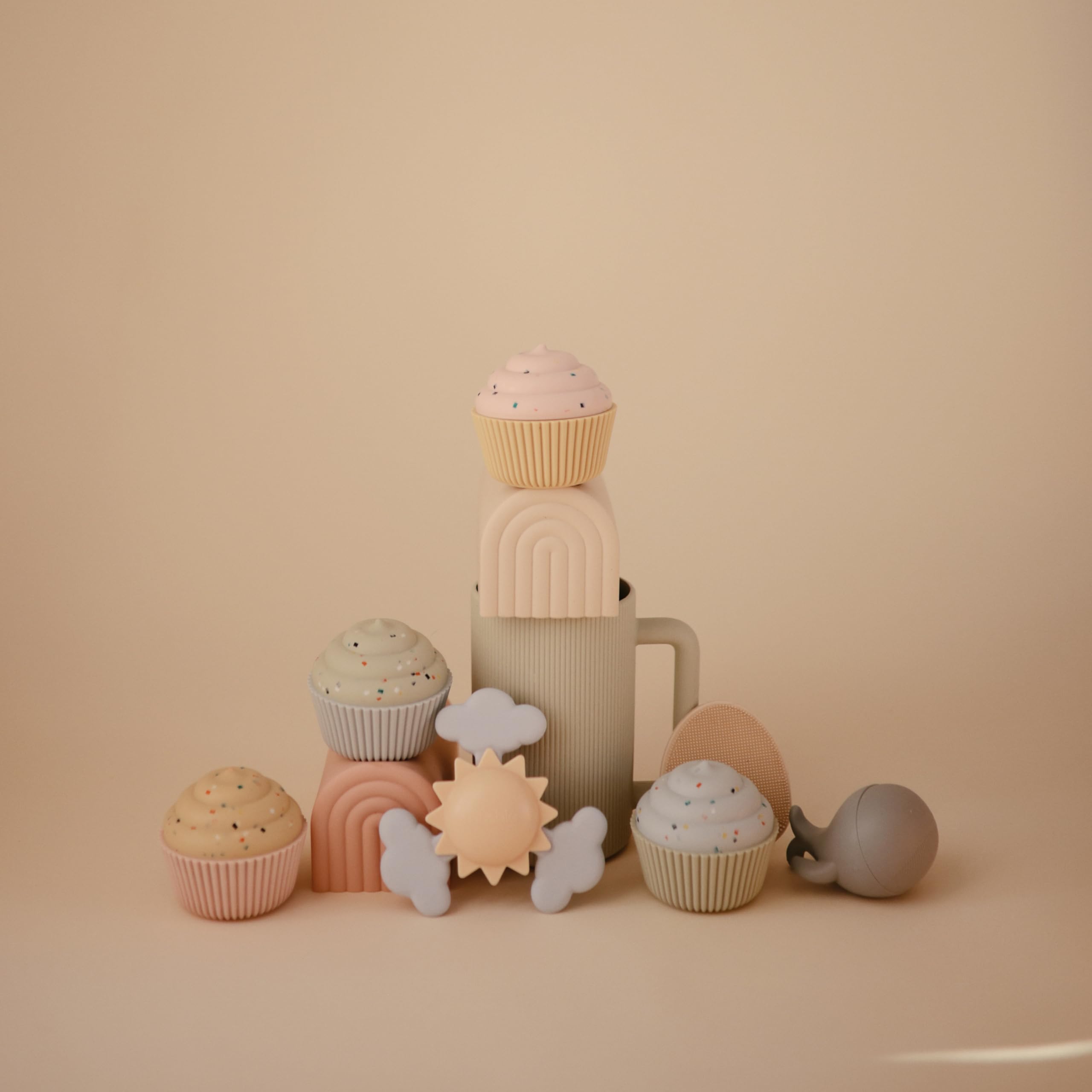 Mushie Sunshine Suction Spinner Toy uses 100% food-grade silicone clouds for a safe tactile feel.