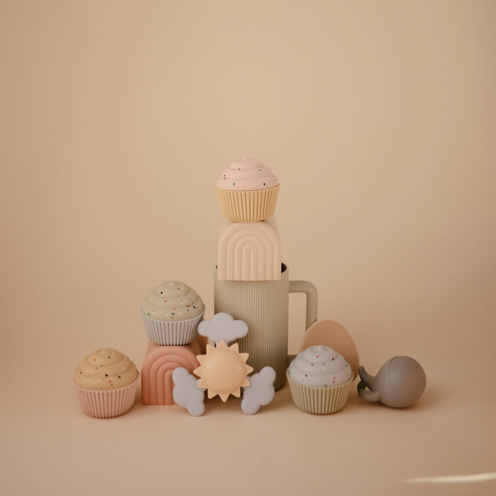 Mushie Sunshine Suction Spinner Toy uses 100% food-grade silicone clouds for a safe tactile feel.