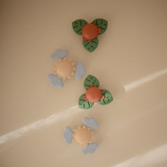 Mushie Sunshine Suction Spinner Toy features strong suction for stable independent play on flat surfaces.