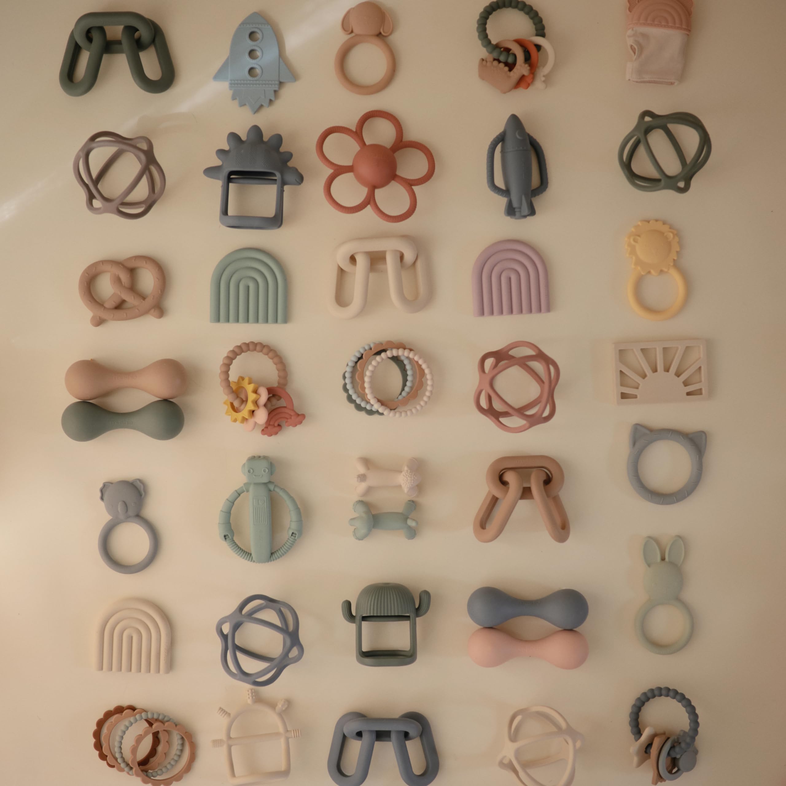 Mushie teething ring handheld size supports little hands during play