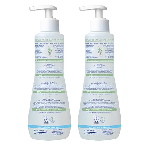 Mustela cleansing water poured onto a cotton pad for quick cleanups.