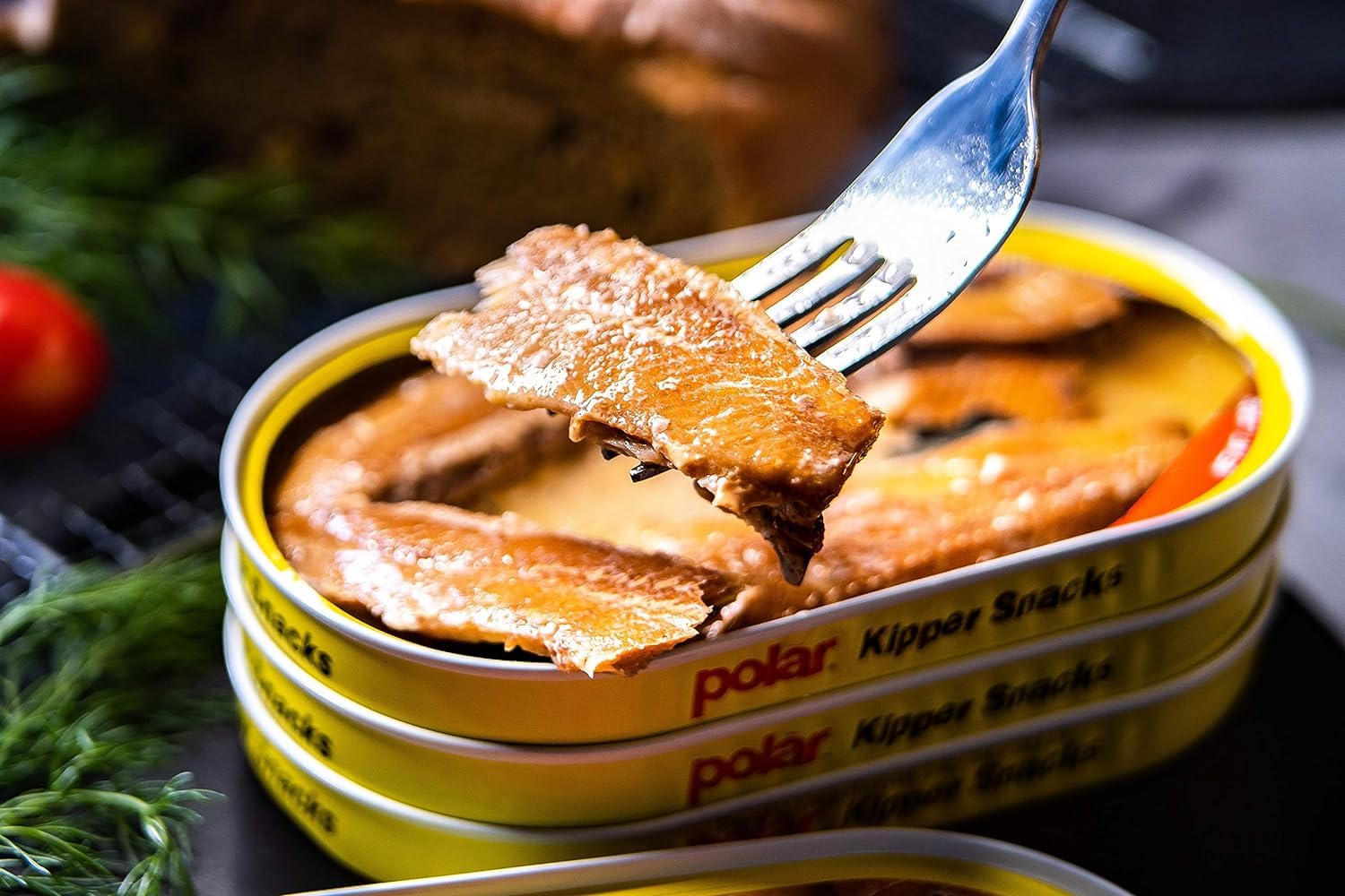 MW Polar kipper snacks canned slice close-up, clean and appetizing.