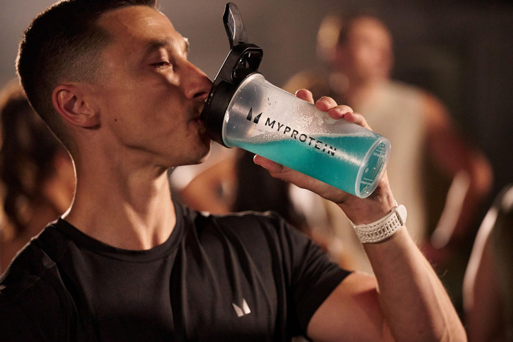 Myprotein Clear Whey Isolate blue raspberry packaging on a desk for gym pantry convenience