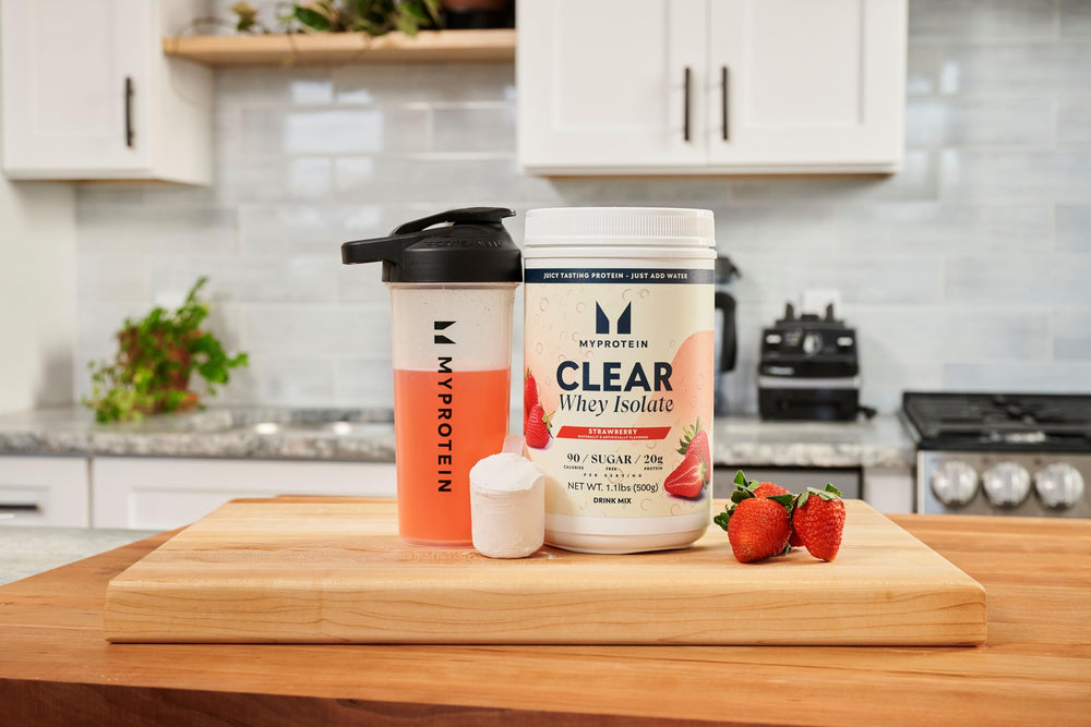 Myprotein Clear Whey Isolate Strawberry powder scoop emphasizes high protein per serving