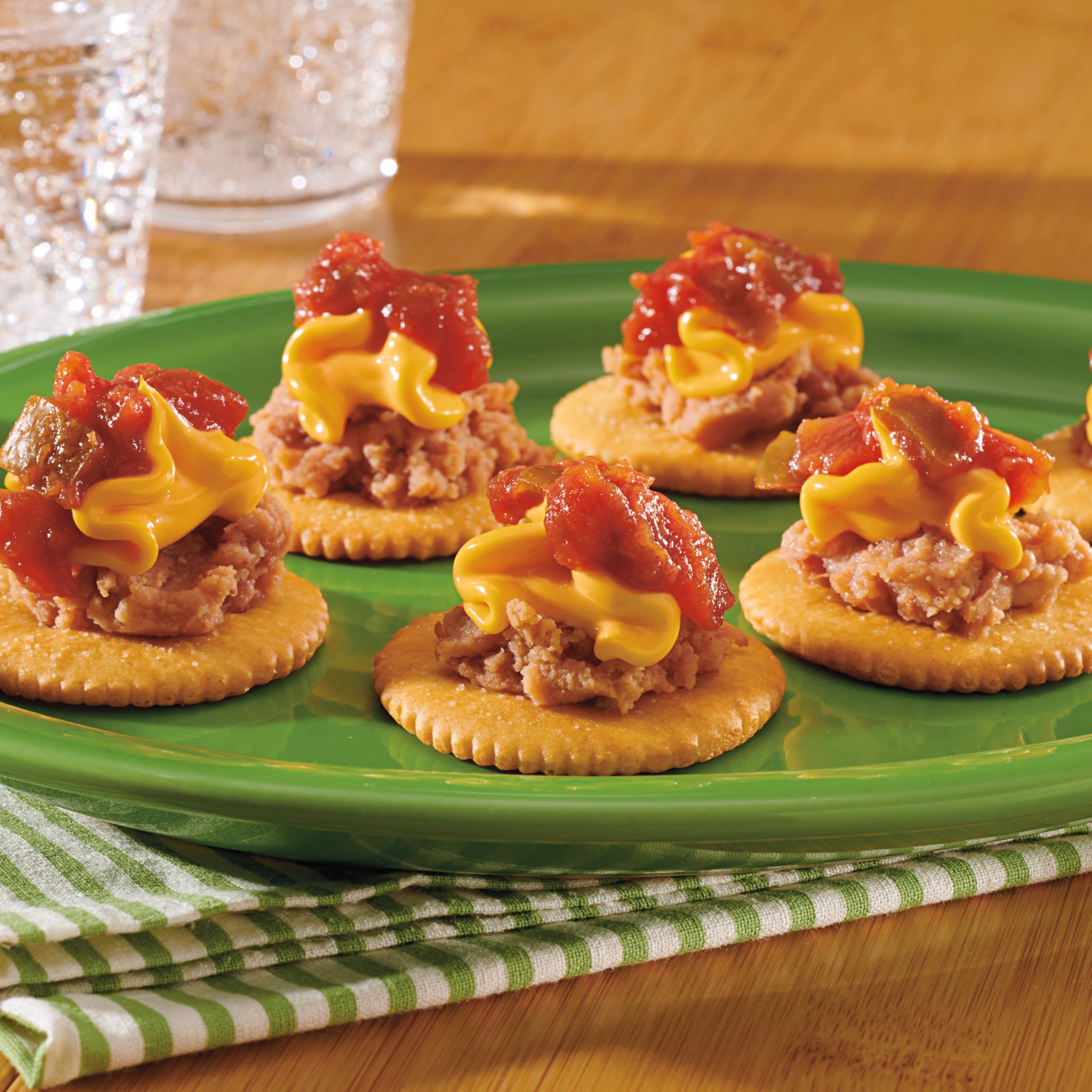 NABISCO Easy Cheese spray can tilted for easy application.