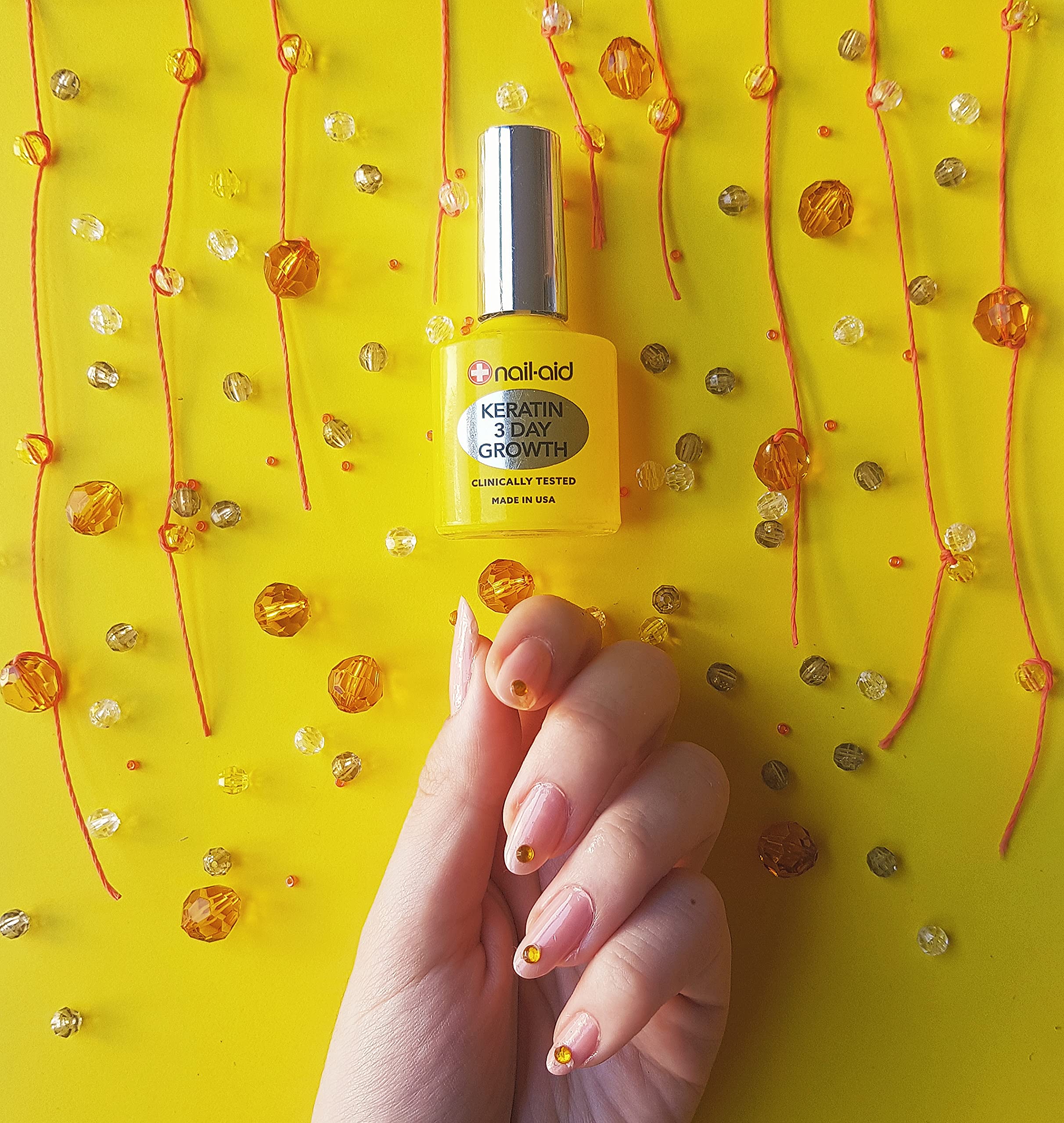 Nail-Aid Keratin 3 Day Growth glossy nail look for color wear.