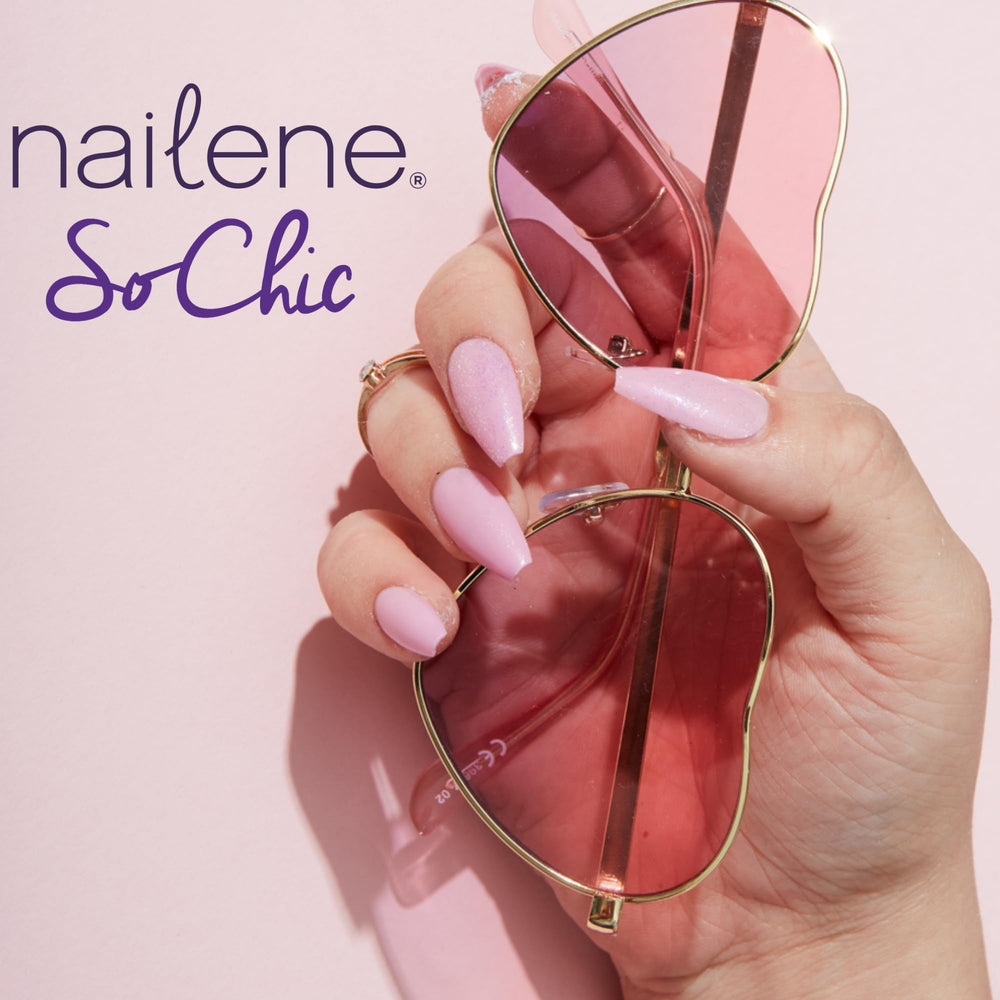 Nailene Perfect Bond Glue pink tint visible as it dries
