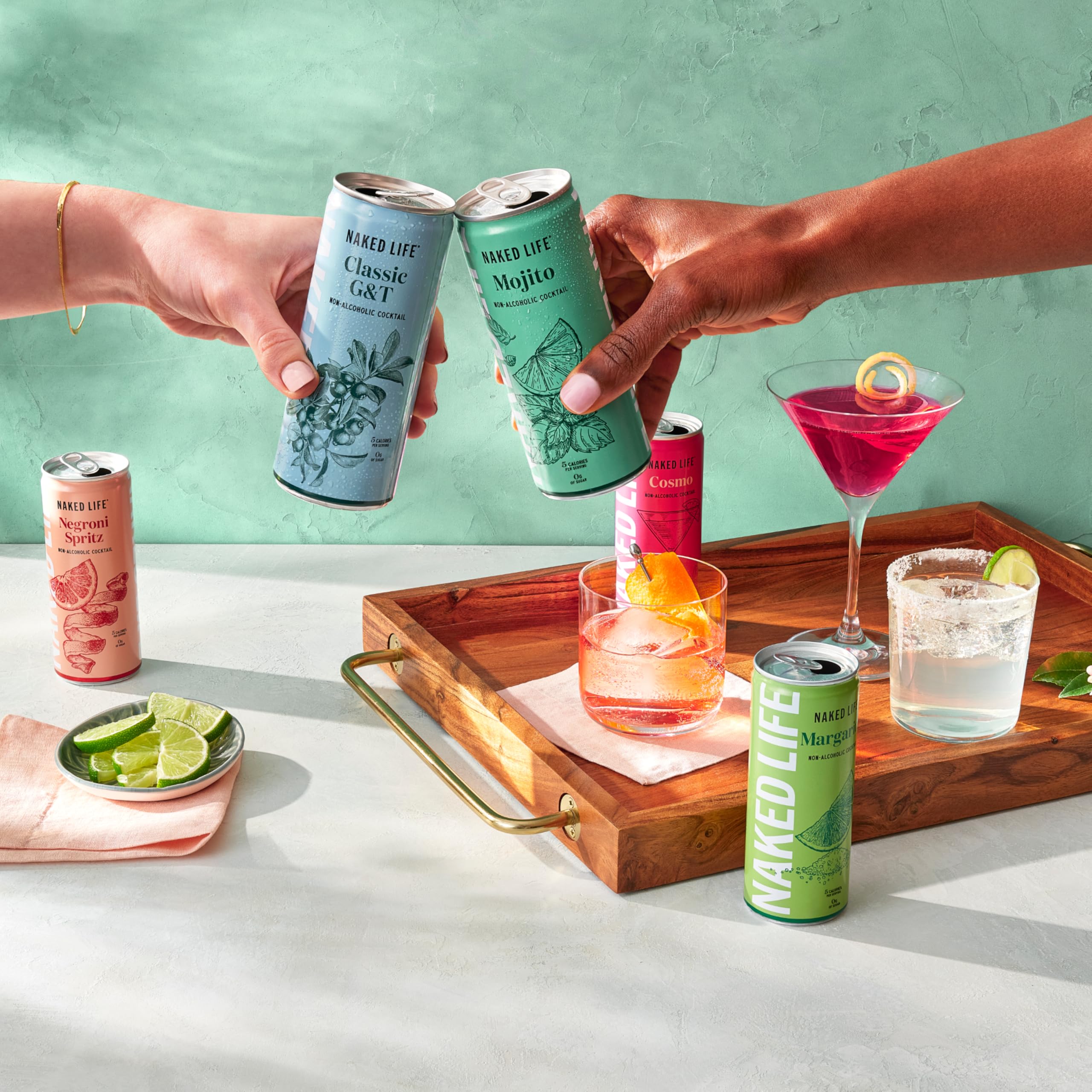 Naked Life Mojito outdoor social scene with glass and lime.