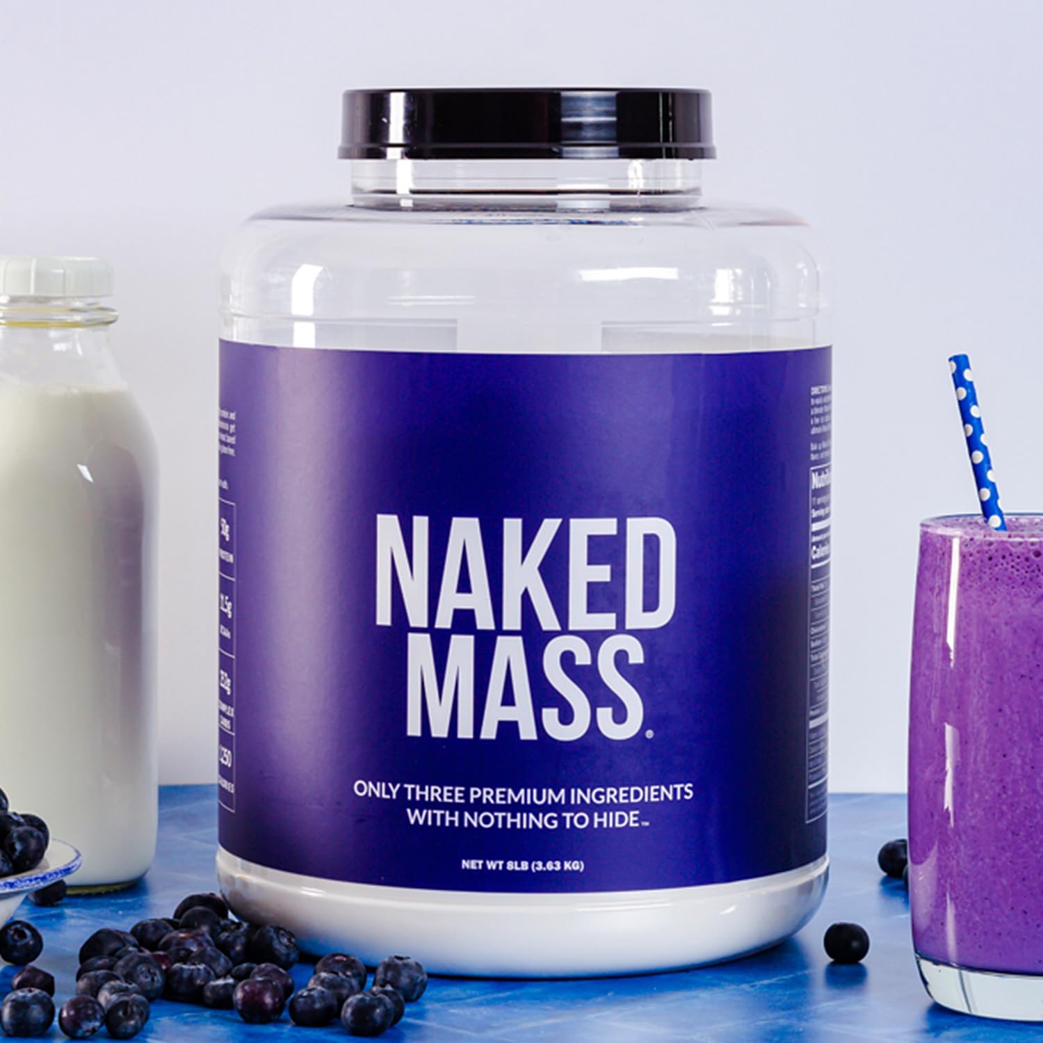 NAKED Mass measuring bottle; shows serving size for consistent daily nutrition.