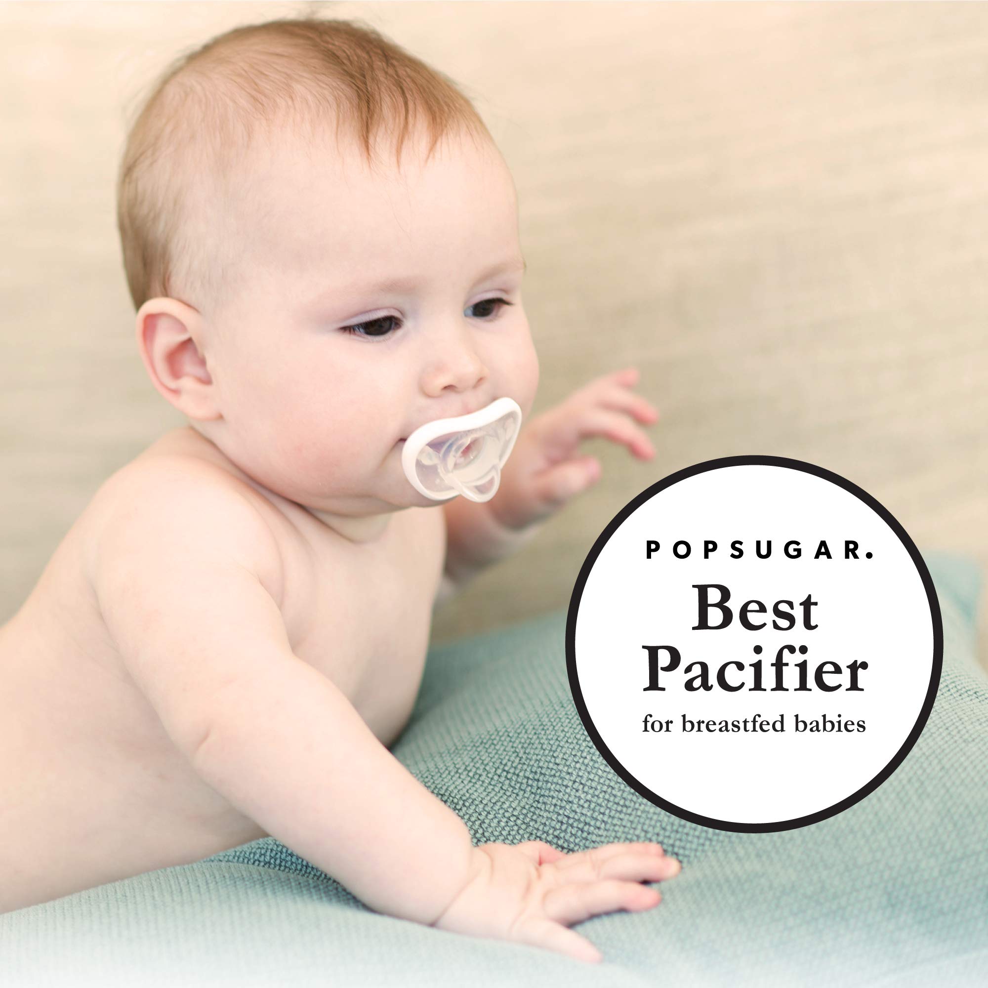 Nanobébé pacifier in use during soothing moment in teal grey