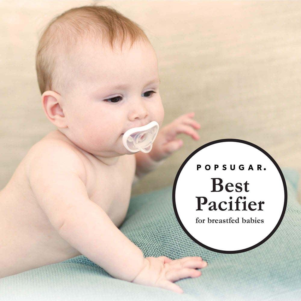 Nanobébé pacifier in use during soothing moment in teal grey