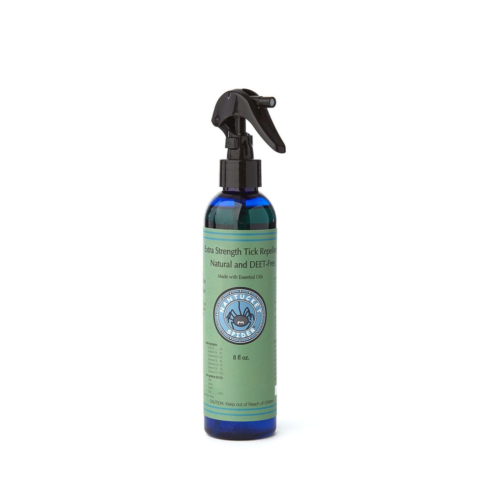 Nantucket Spider DEET-free tick repellent bottle ready for outdoor use