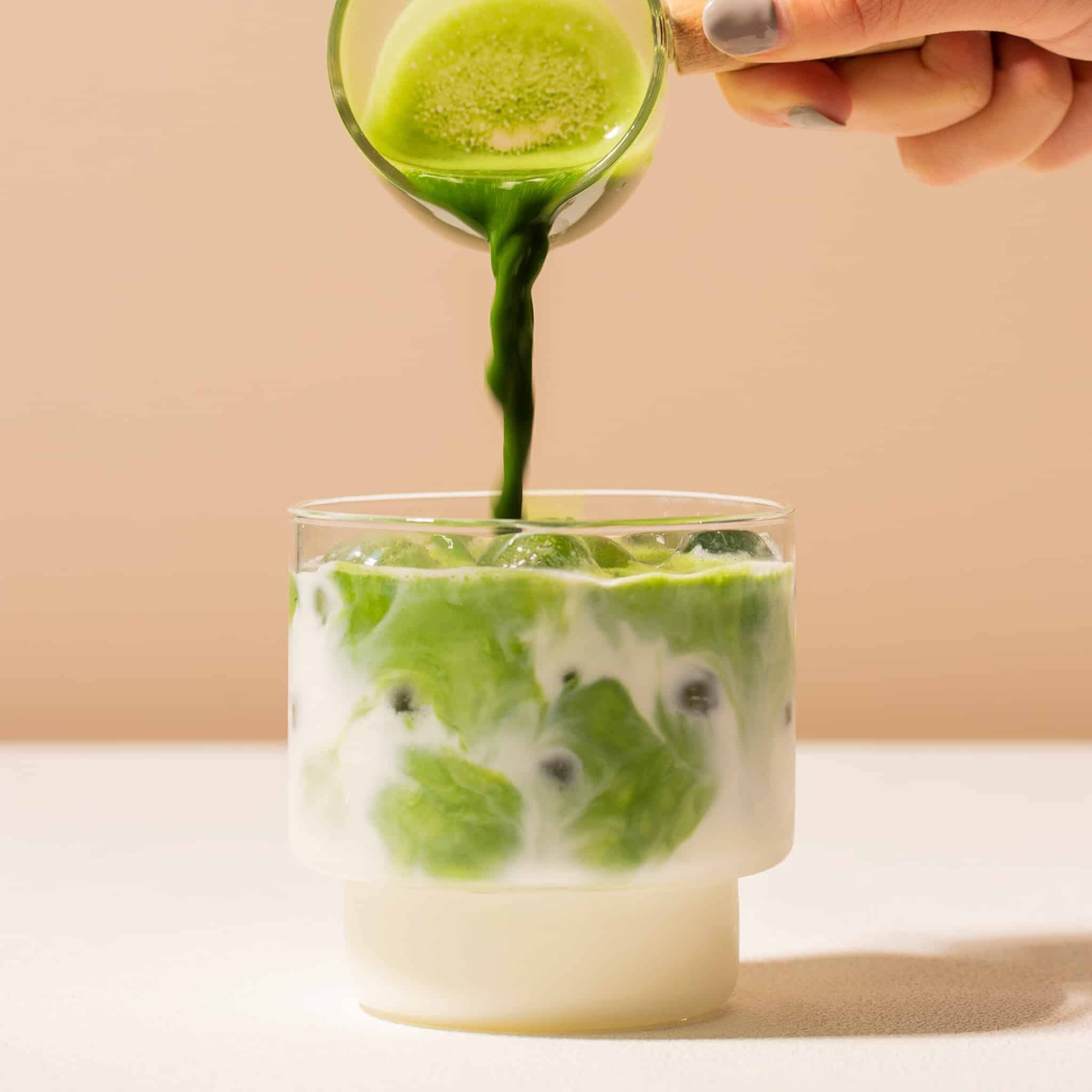 Naoki Matcha powder close-up shows vibrant green for rituals.