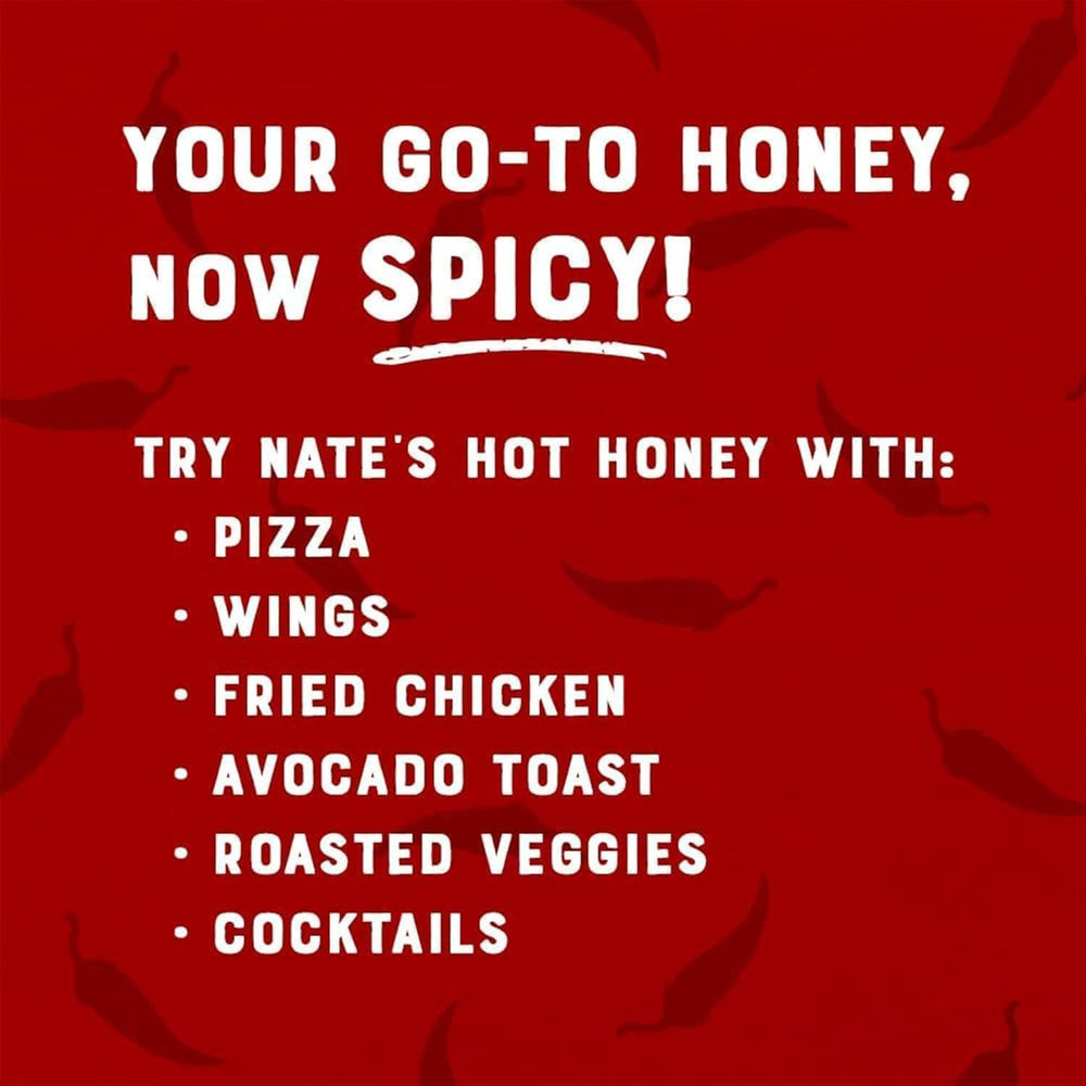 Charcuterie board drizzled with Nate's Hot Honey for balanced heat.