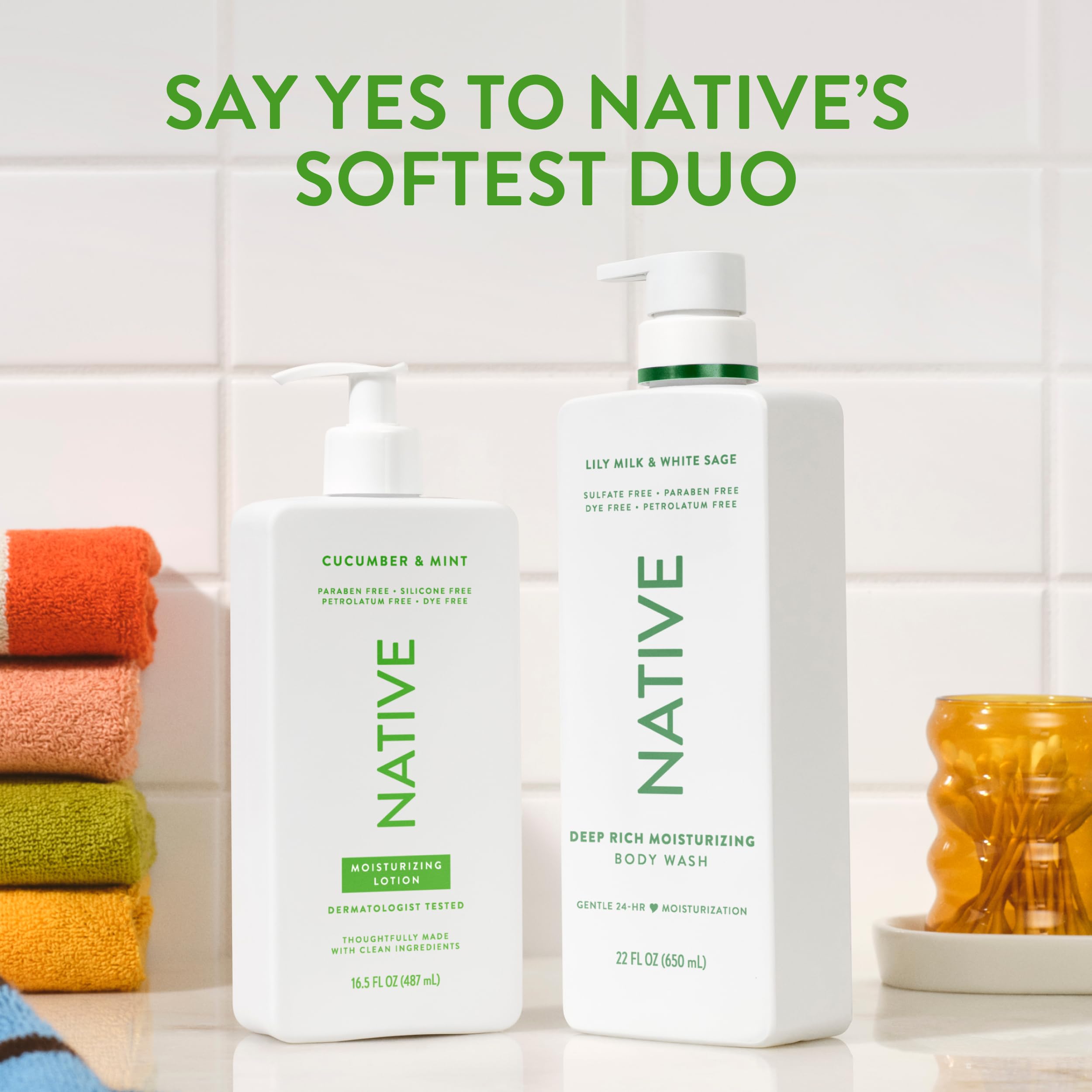 Travel-size Native Body Lotion shown beside travel essentials on a vanity.