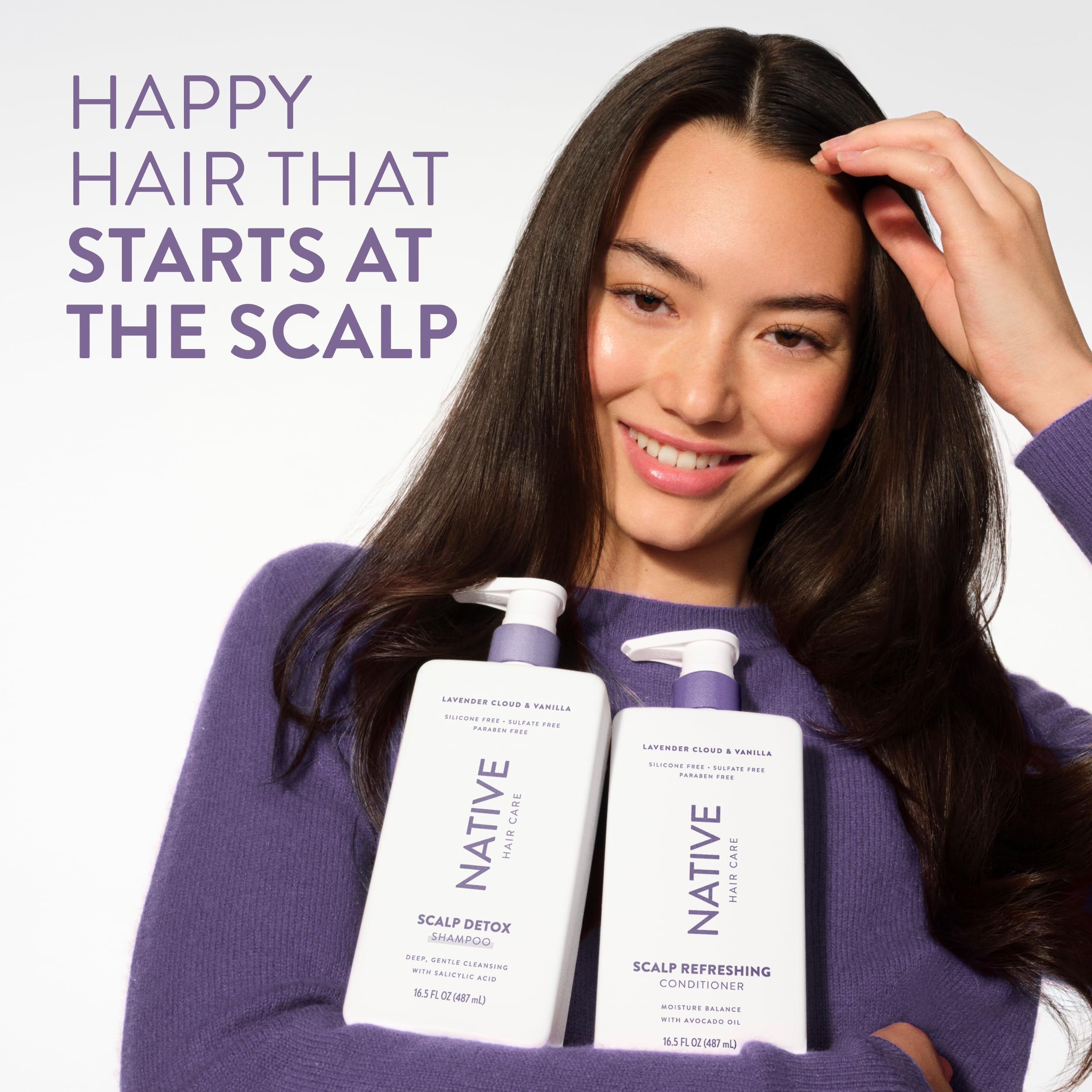 Hands massaging Native Scalp Detox Shampoo into the scalp