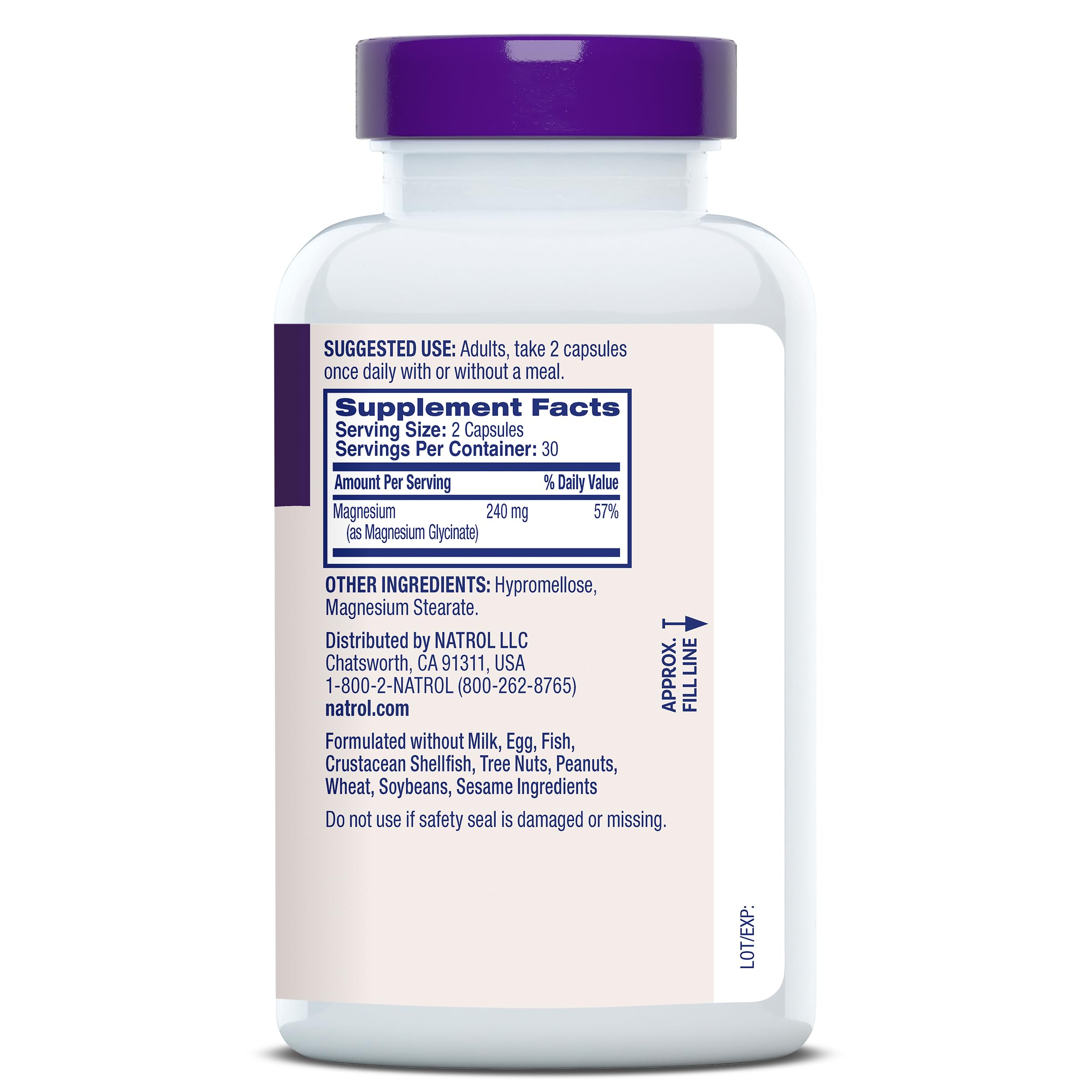 Natrol Magnesium Glycinate bottle on nightstand with dim lighting