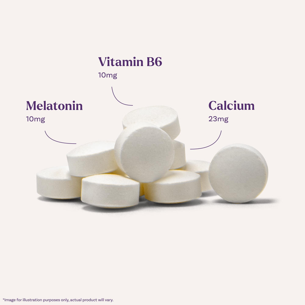 Natrol Melatonin bottle on nightstand setup suggests nightly routine before sleep.