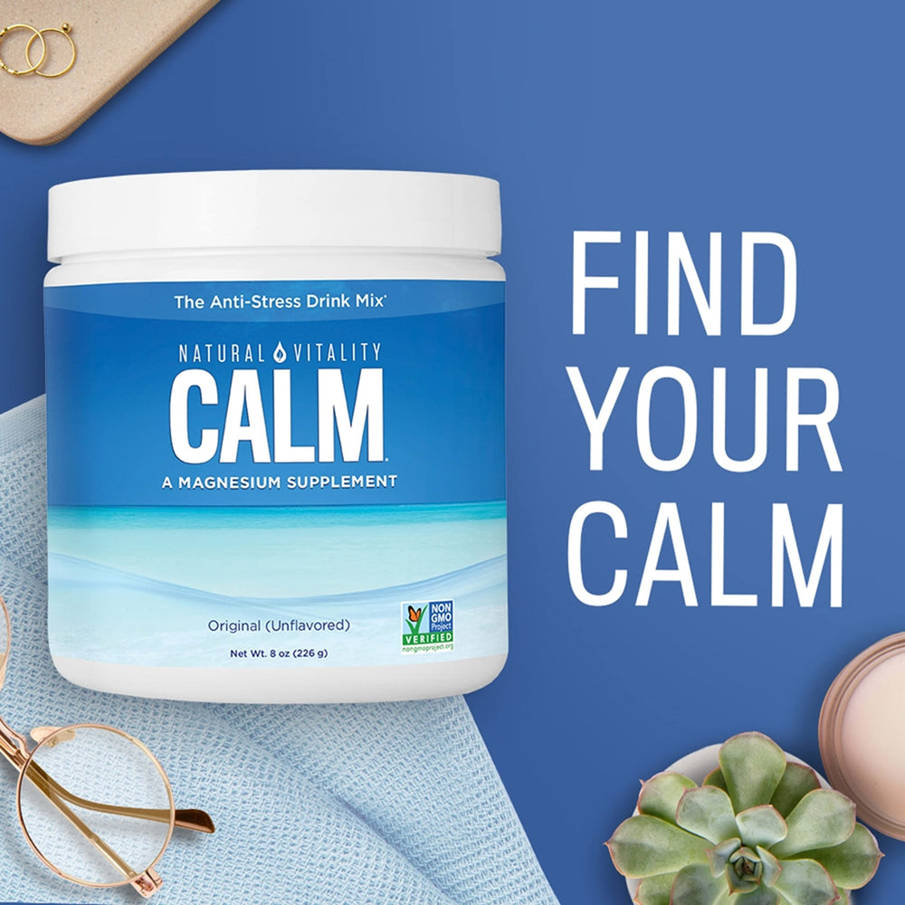 CALM bottle placed for a nighttime routine by the bed