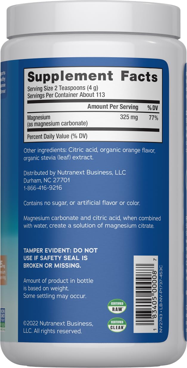Natural Vitality CALM powder dissolving in water to create a soothing orange drink.