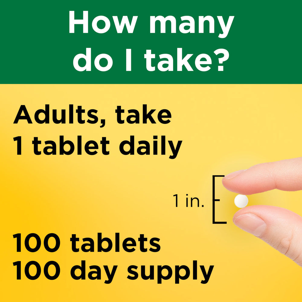 B1 tablet with a glass of water for daily intake.