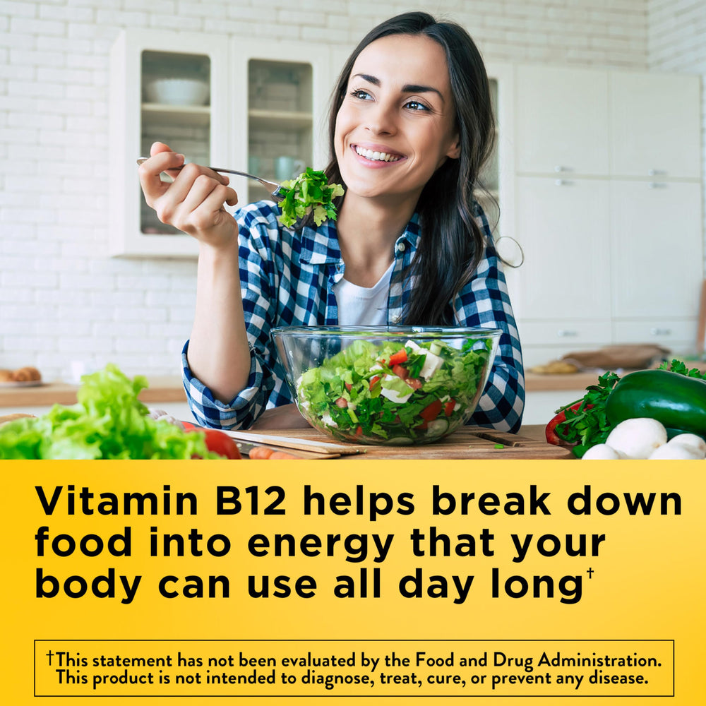 Pouring Nature Made Vitamin B12 softgels into a glass for energy metabolism.