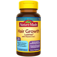 Nature Made Hair Growth Softgels bottle with label for aging hair