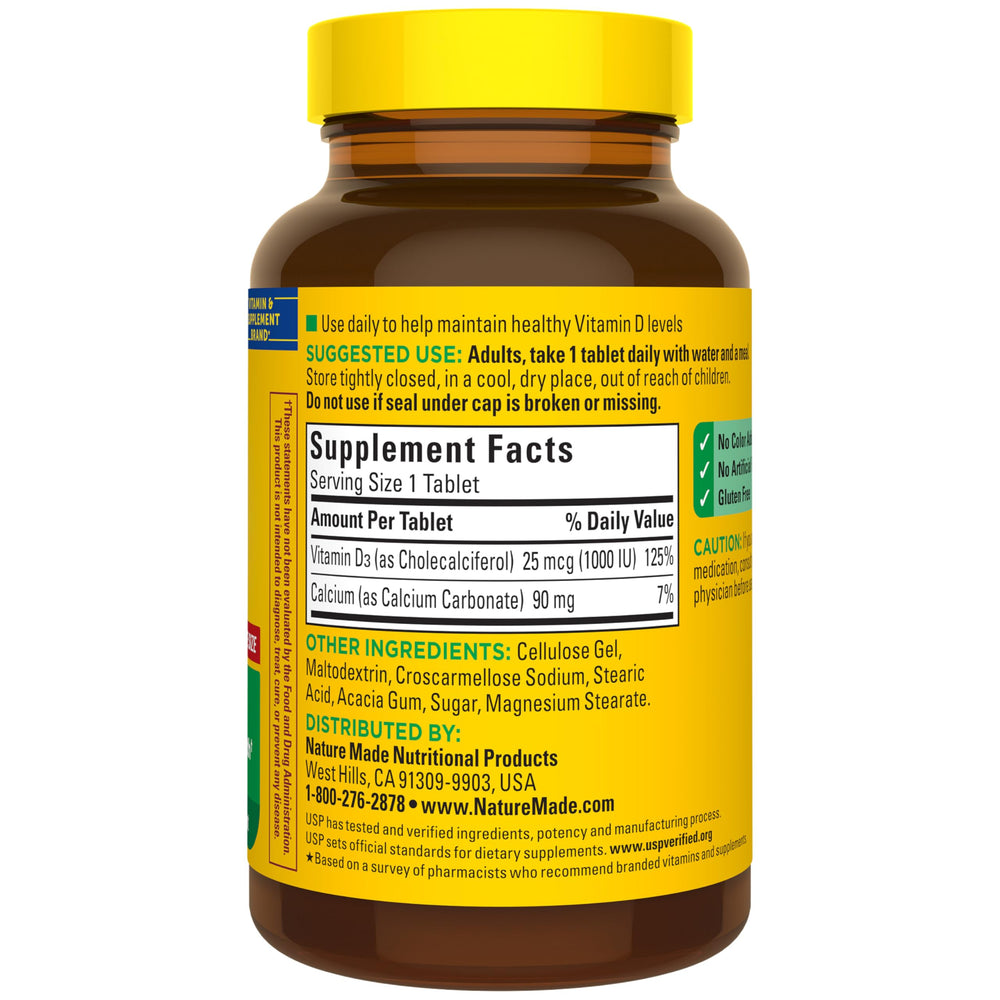 Nature Made D3 1000 IU tablet close-up with no artificial flavors label.
