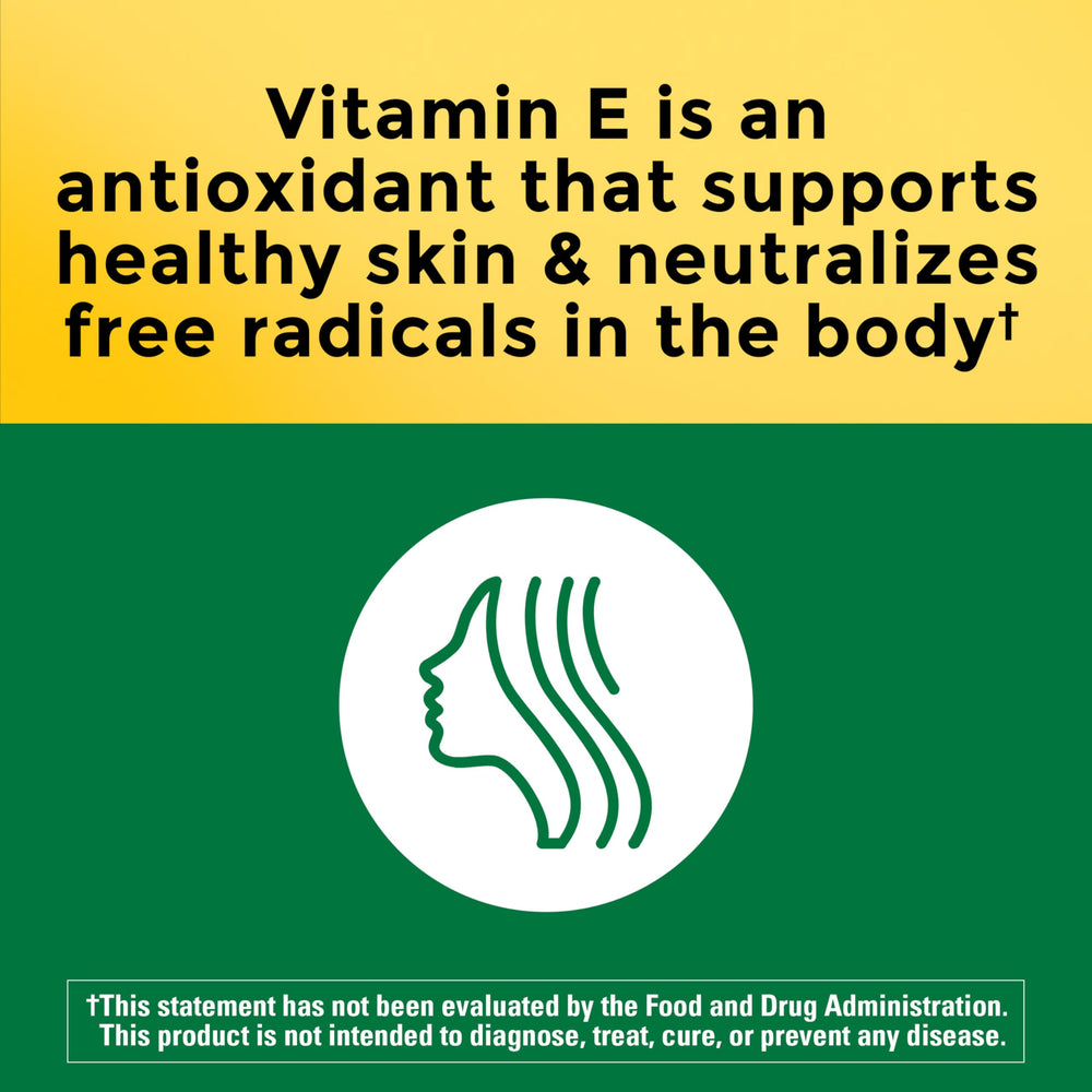Nature Made Vitamin E softgels close-up showing d-Alpha form and bioavailability.