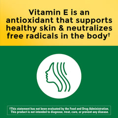 Nature Made Vitamin E softgels close-up showing d-Alpha form and bioavailability.