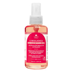 Nature Spell Stretch Mark Oil bottle close-up promotes elasticity and hydration.