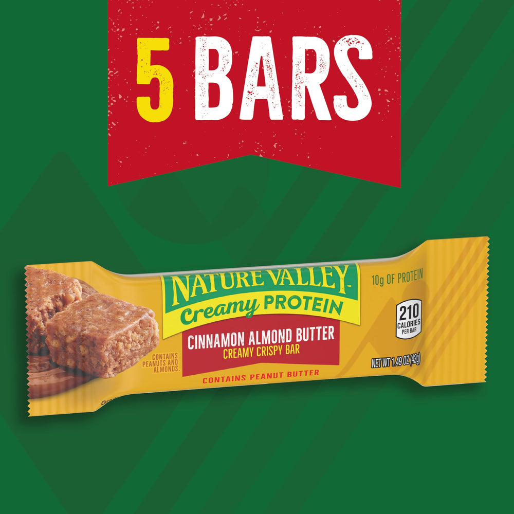 Cross-section of Nature Valley bar reveals almond and peanut butter with oats