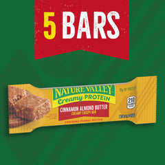 Cross-section of Nature Valley bar reveals almond and peanut butter with oats
