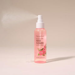 NATURE WELL Rose Water Toner Mist Dispense showing easy refreshing application.