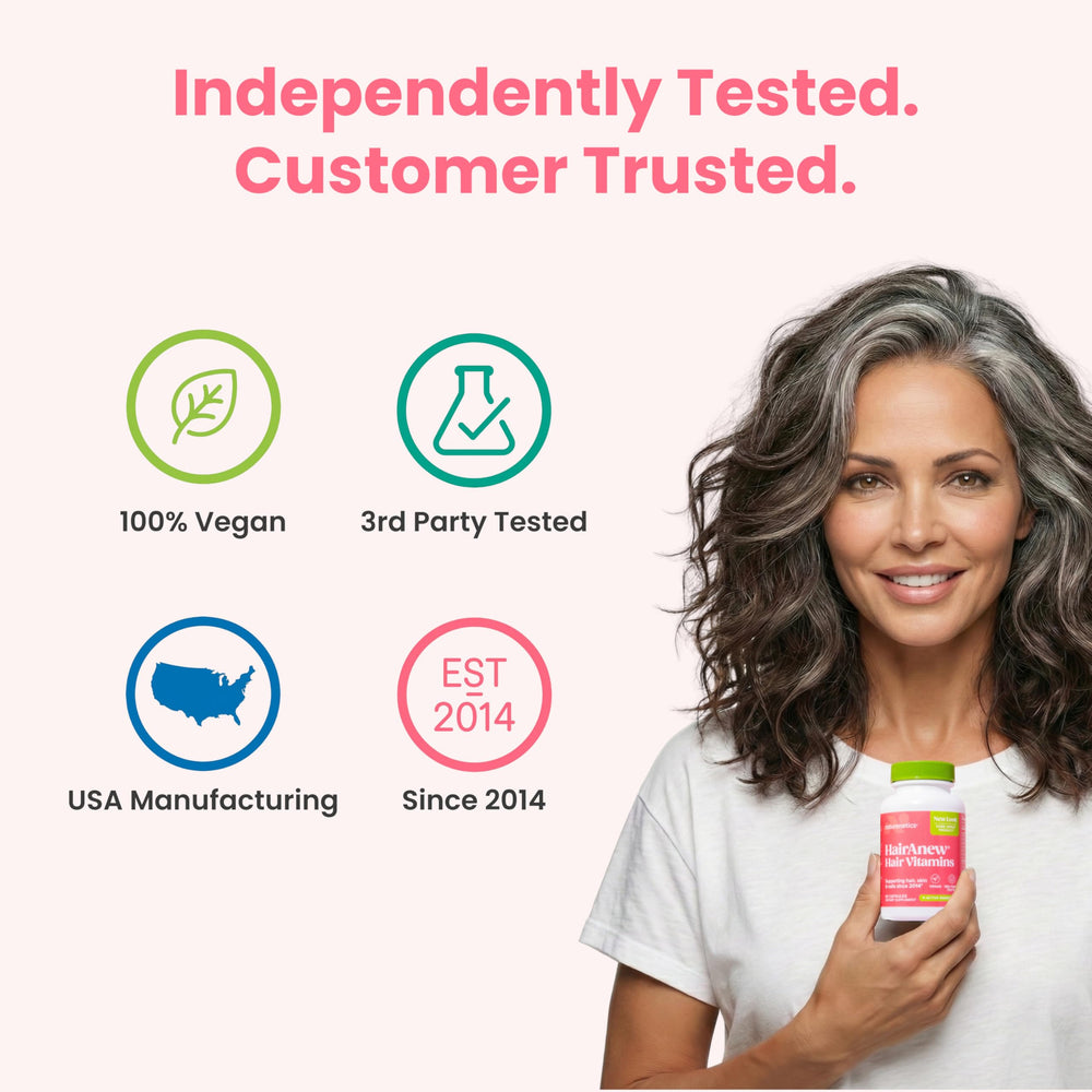 Capsules in hand for easy daily use with Naturenetics HairAnew.