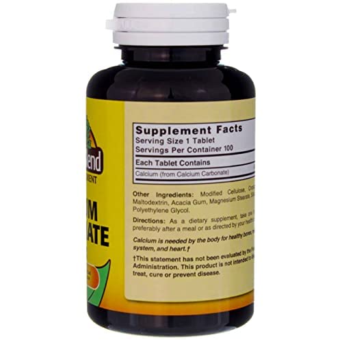 Bottle beside water illustrating daily calcium intake routine