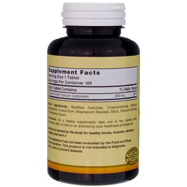 Person taking a Nature's Blend tablet for convenient supplementation