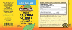 Nature's Blend Blueberry liquid calcium bottle pours for easy daily supplementation.