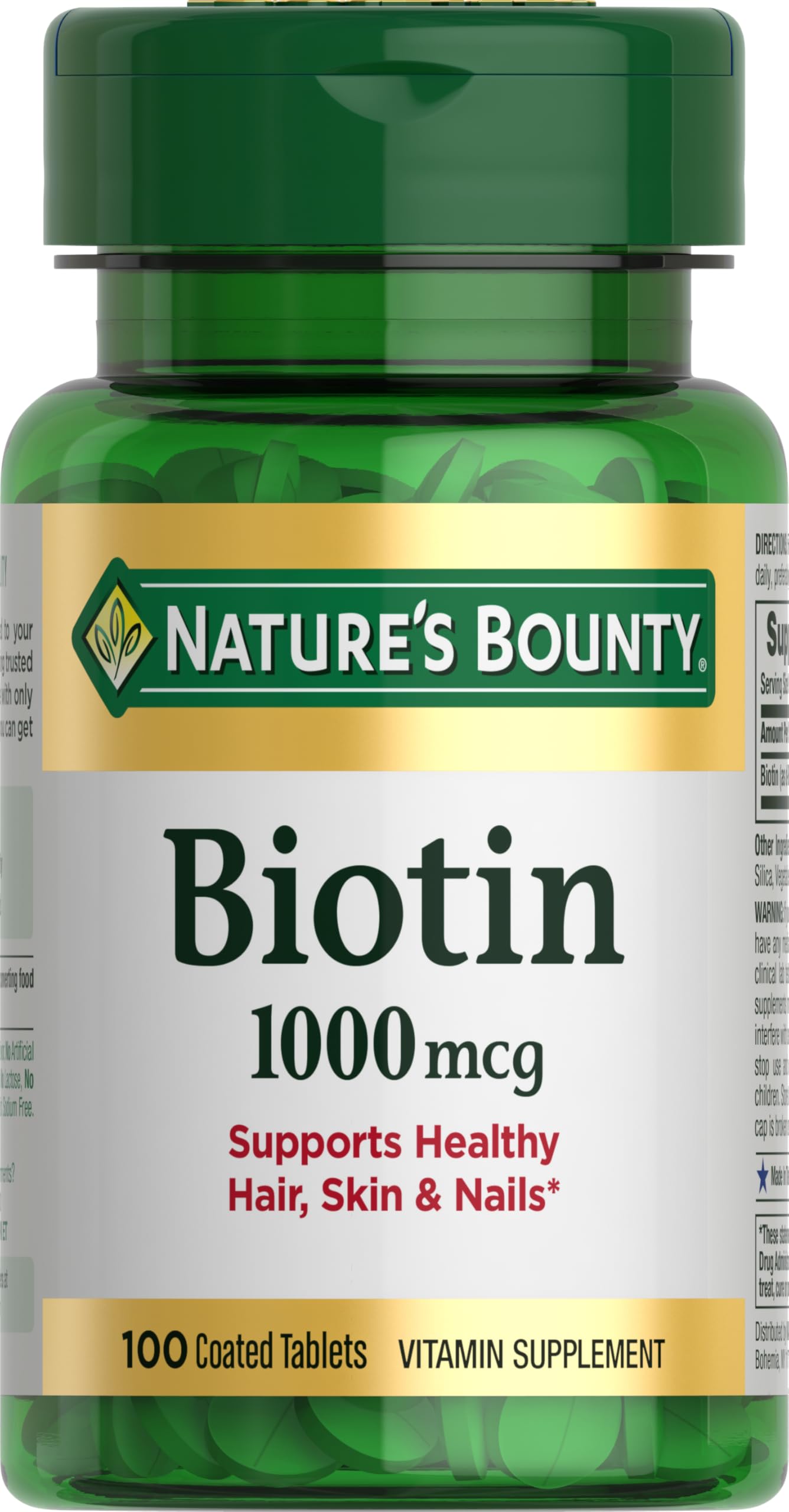 Nature's Bounty Biotin bottle close-up emphasizing energy metabolism support