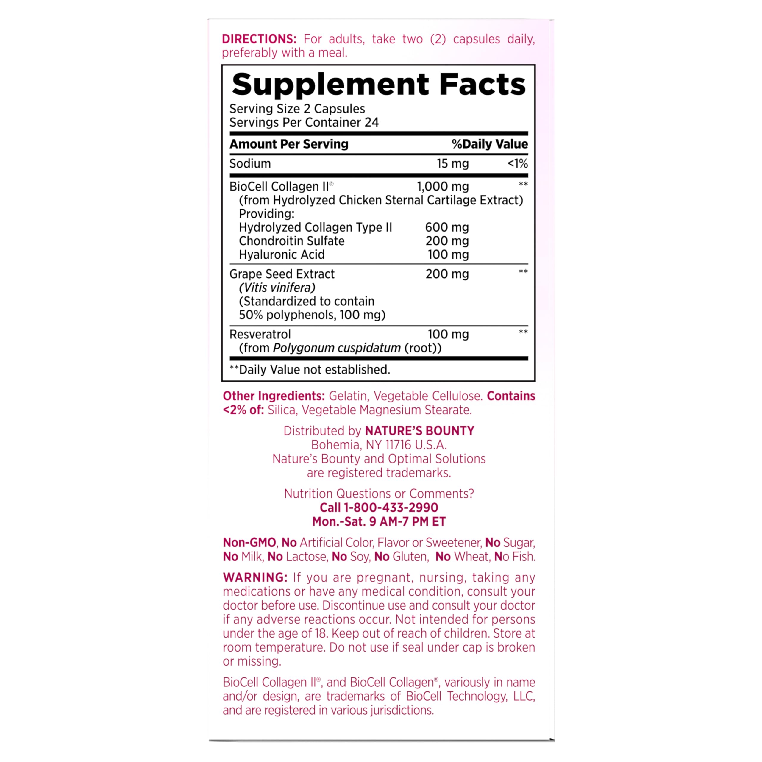 Capsules beside a glass of water for hydration and skin nourishment.