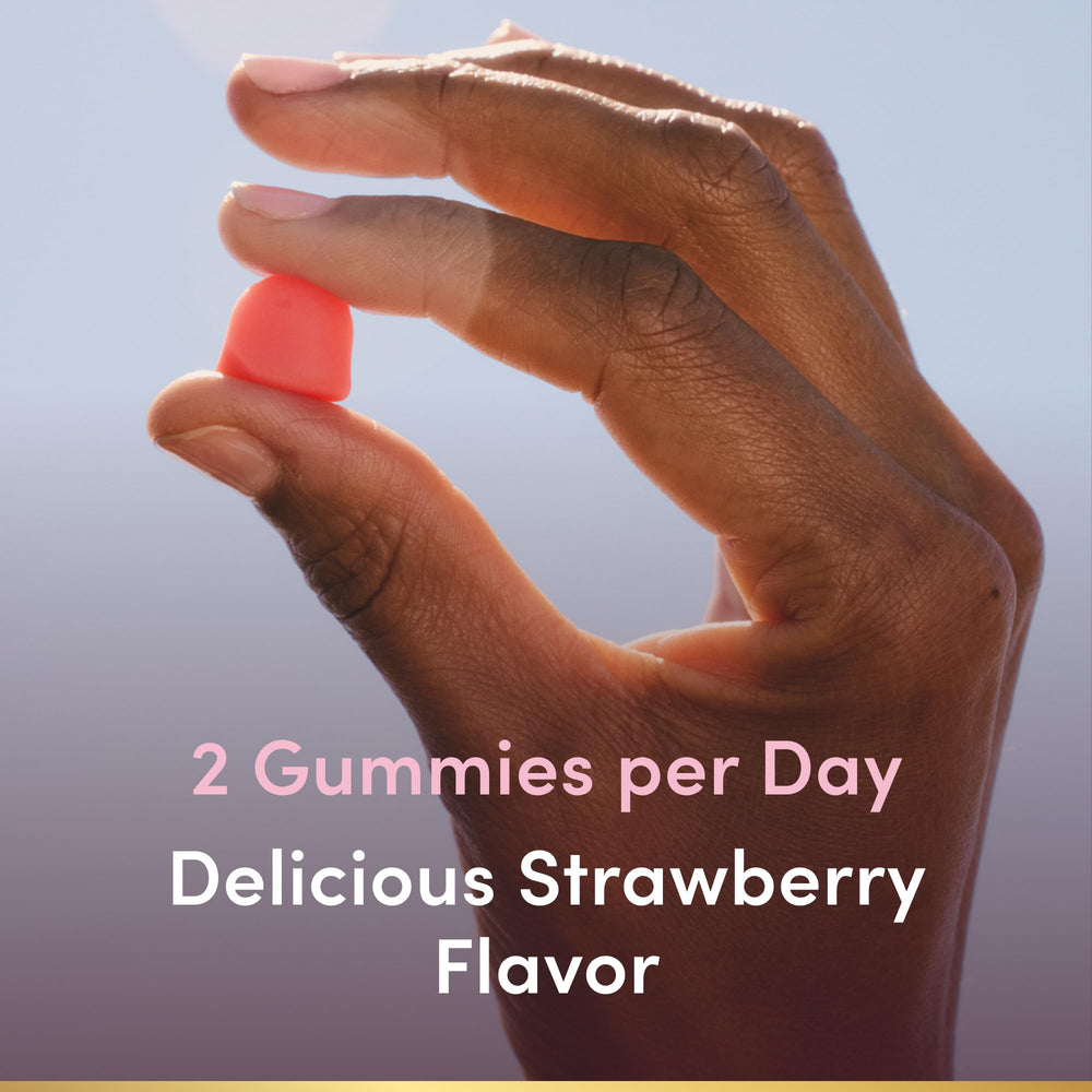 Nature's Bounty strawberry-flavored gummies on table for wellness snacking