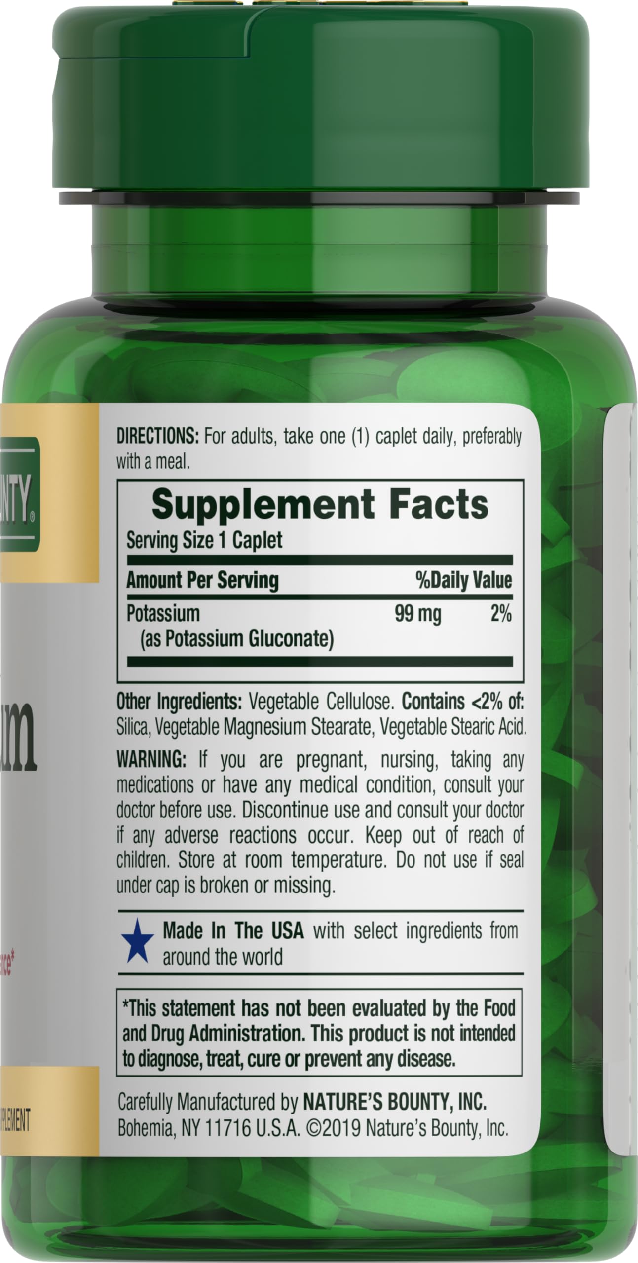 Nature's Bounty potassium caplets bottle pour; promotes muscle activity support.